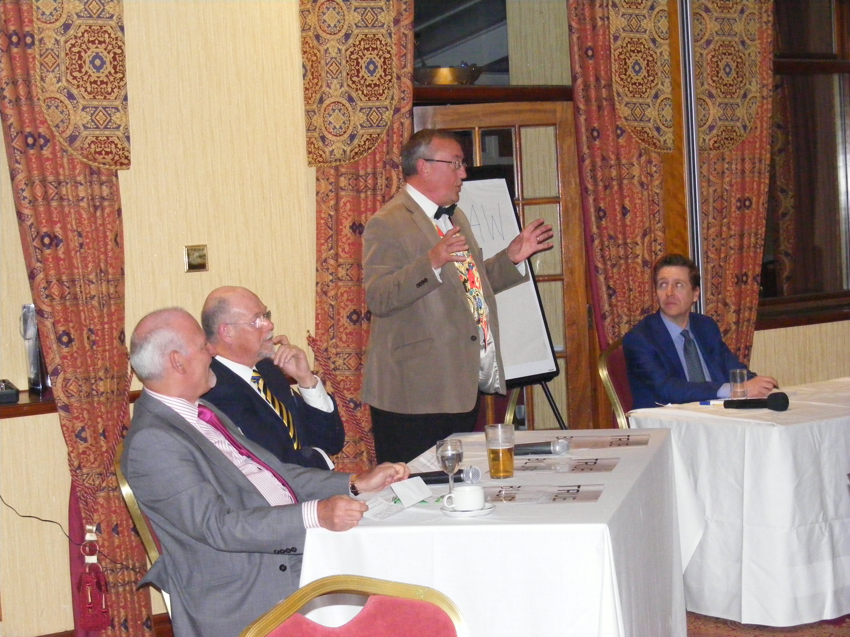 Peter regales the audience with one of his tales.