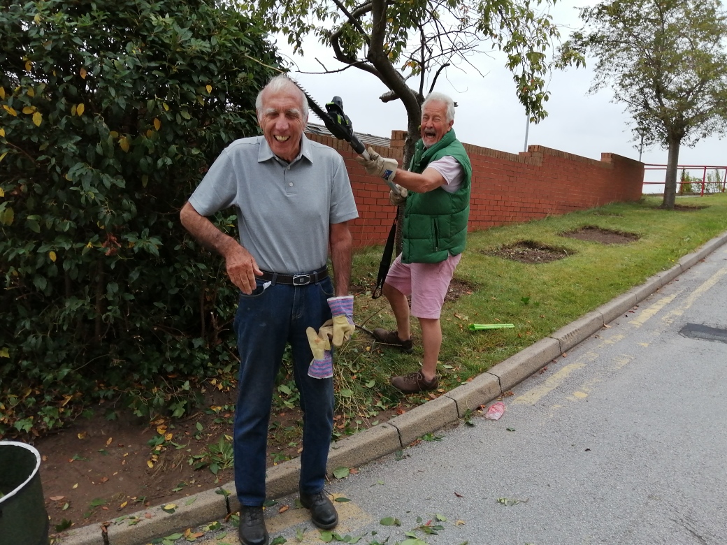 Roger gives Brian a short back and sides 