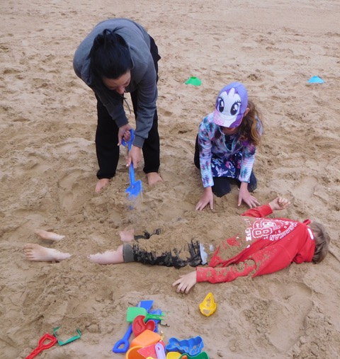 The traditional burying in the sand