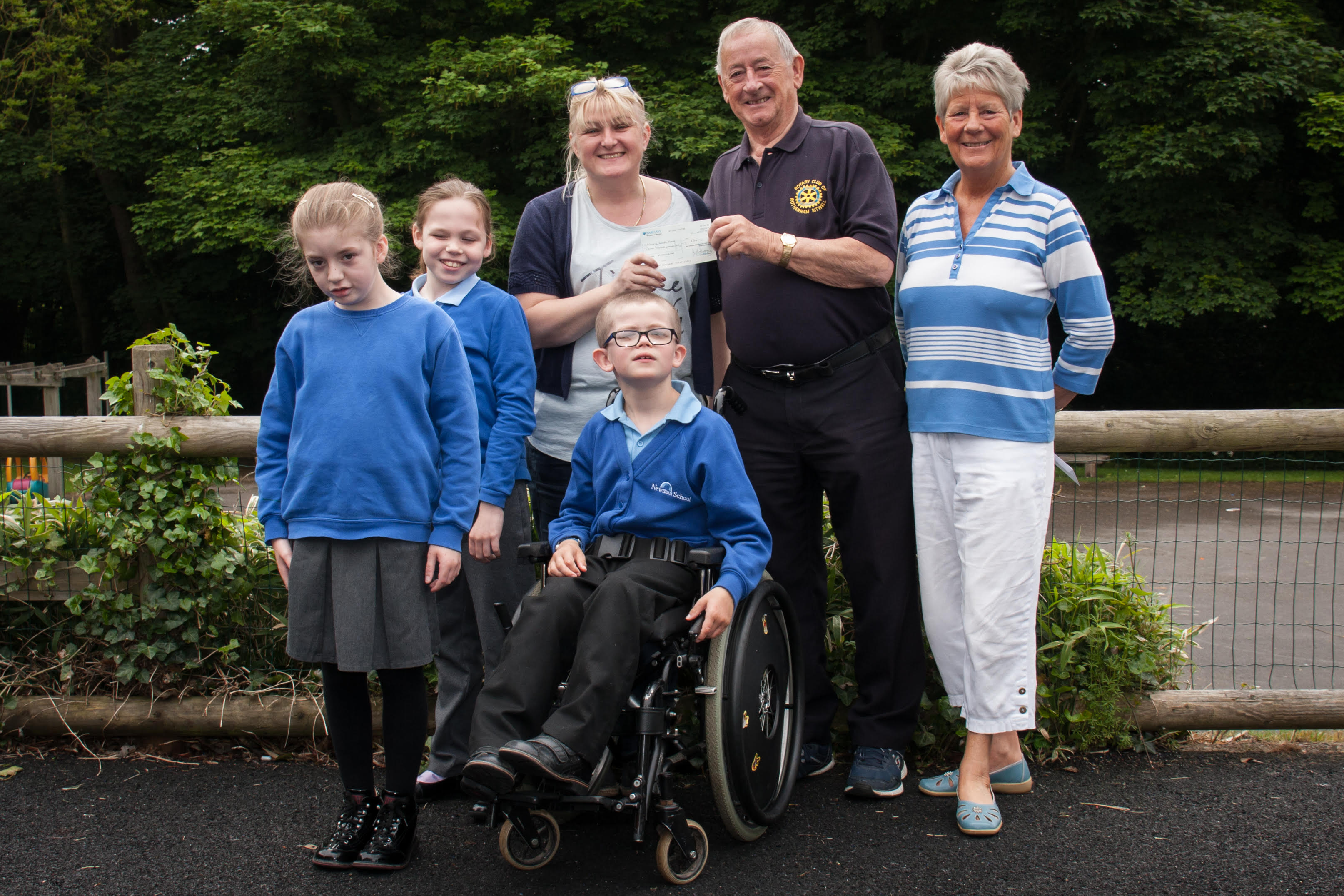Phil and Dot presenting the cheque