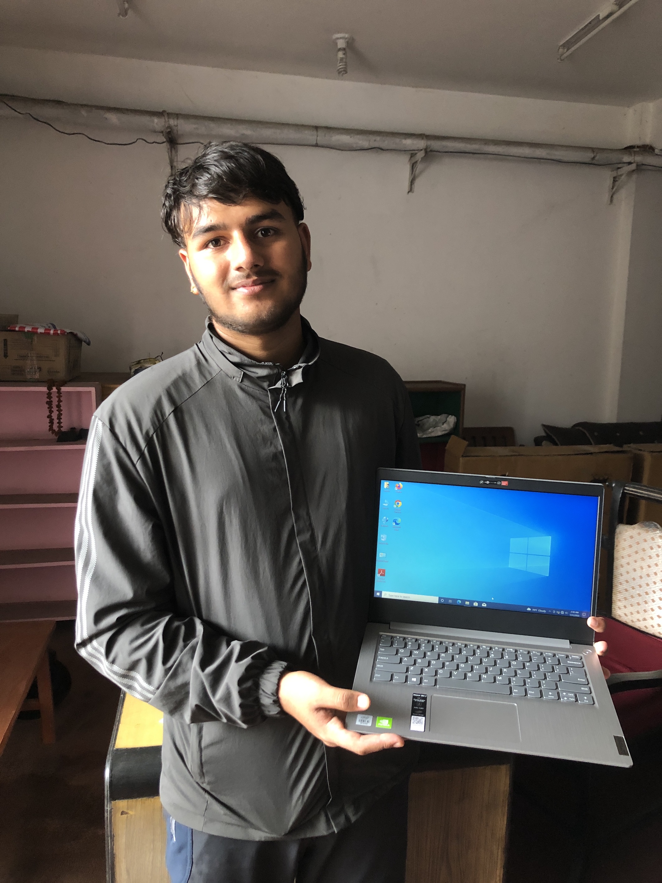 Dibas with his laptop 